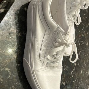 Vans all white.